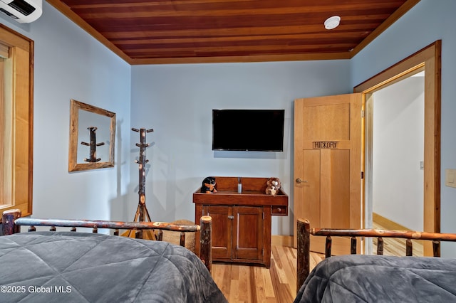 555 Trout Lake Rd, Bolton, NY 12824 - bedroom featuring wood ceiling, wood finished floors, and a wall mounted air conditioner