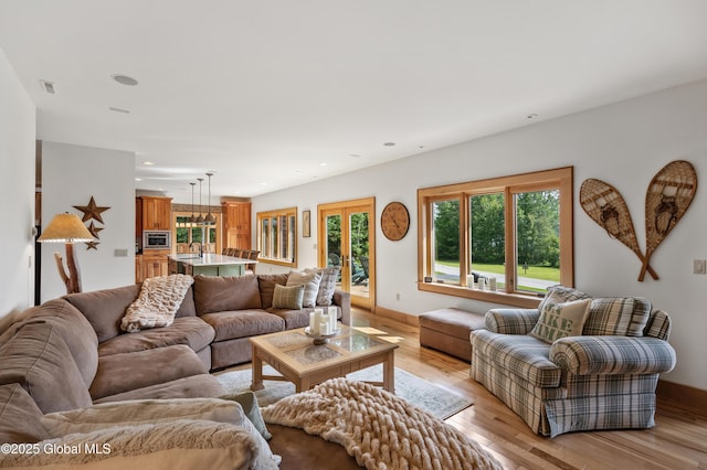 555 Trout Lake Rd, Bolton, NY 12824 - living area with light wood-style floors and recessed lighting