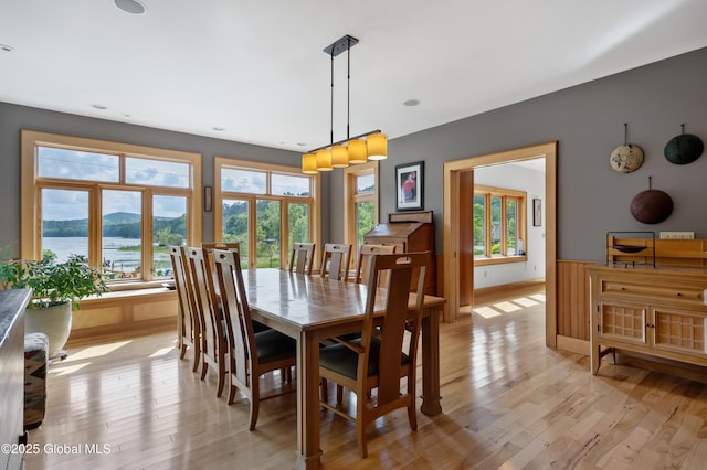 555 Trout Lake Rd, Bolton, NY 12824 - dining area featuring light wood-style flooring and a water view