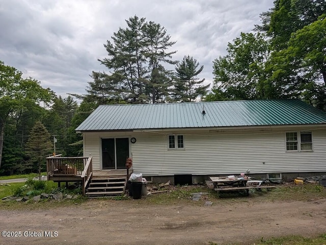 312 Ridge Rd, Northampton, NY 12134 - rear view of house featuring a deck and a metal roof