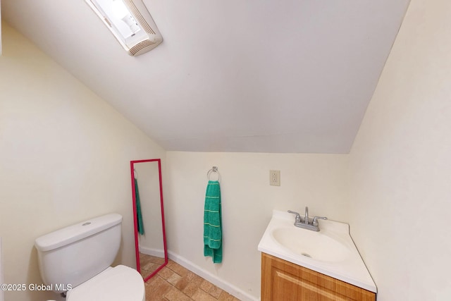 66 Roosevelt Ave, Schenectady, NY 12304 - bathroom featuring lofted ceiling and vanity