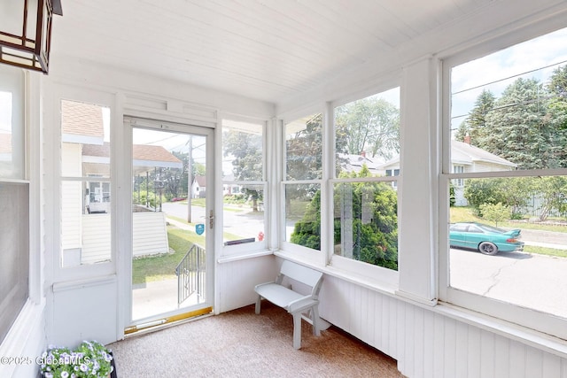 66 Roosevelt Ave, Schenectady, NY 12304 - sunroom / solarium featuring carpet floors and plenty of natural light