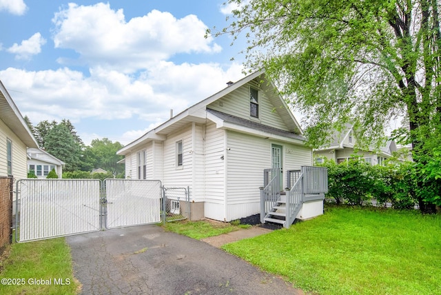 66 Roosevelt Ave, Schenectady, NY 12304 - view of home's exterior with a gate