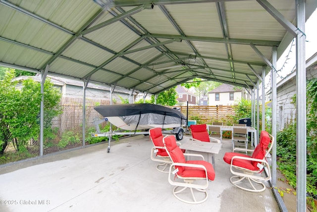 66 Roosevelt Ave, Schenectady, NY 12304 - view of patio with a carport and outdoor dining space