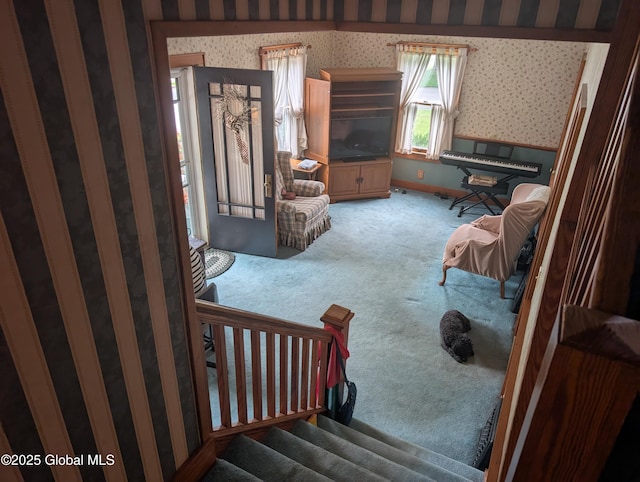 19 High St, Fort Plain, NY 13339 - carpeted living area featuring wallpapered walls and stairs