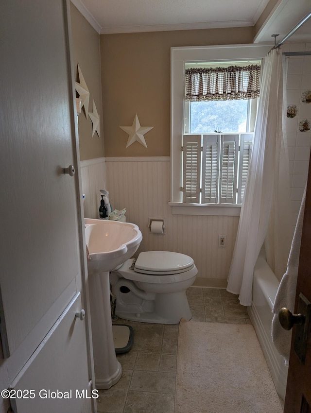 19 High St, Fort Plain, NY 13339 - full bath with a wainscoted wall, ornamental molding, shower / bathtub combination with curtain, and tile patterned flooring