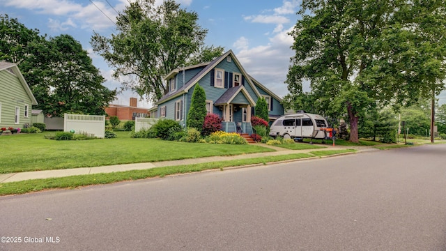 19 High St, Fort Plain, NY 13339 - view of front facade featuring a front lawn