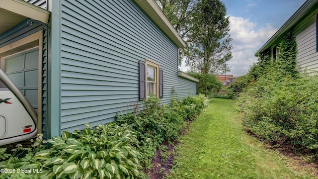 19 High St, Fort Plain, NY 13339 - view of side of home with a yard