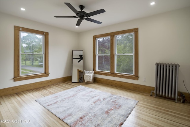 11 River St, Stamford, NY 12167 - unfurnished room featuring radiator heating unit, recessed lighting, a ceiling fan, and wood finished floors