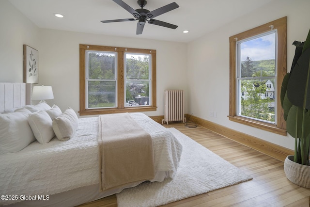 11 River St, Stamford, NY 12167 - bedroom featuring radiator, wood finished floors, recessed lighting, and a ceiling fan