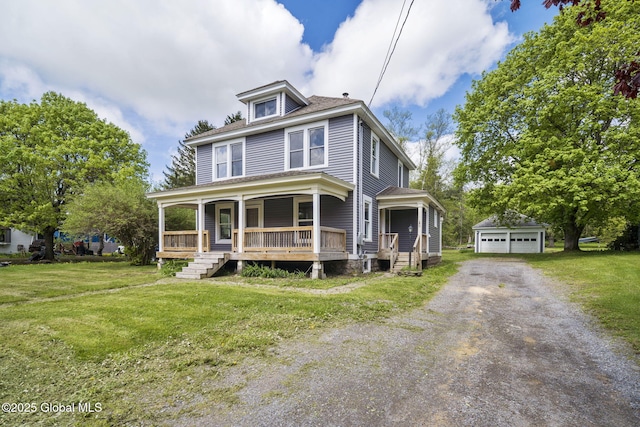11 River St, Stamford, NY 12167 - american foursquare style home featuring an outdoor structure, covered porch, a front yard, and a garage