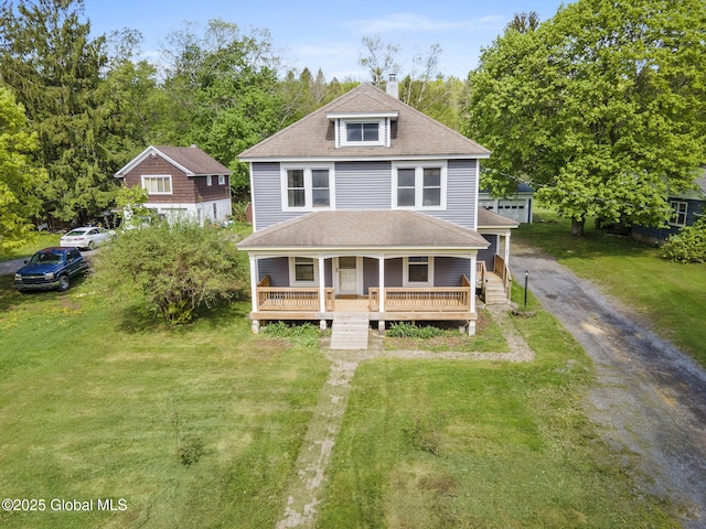11 River St, Stamford, NY 12167 - american foursquare style home with covered porch, a front lawn, and roof with shingles