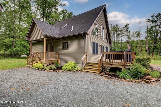 349 Methodist Farm Rd, Sand Lake, NY 12018 - view of property exterior featuring roof with shingles and a wooden deck