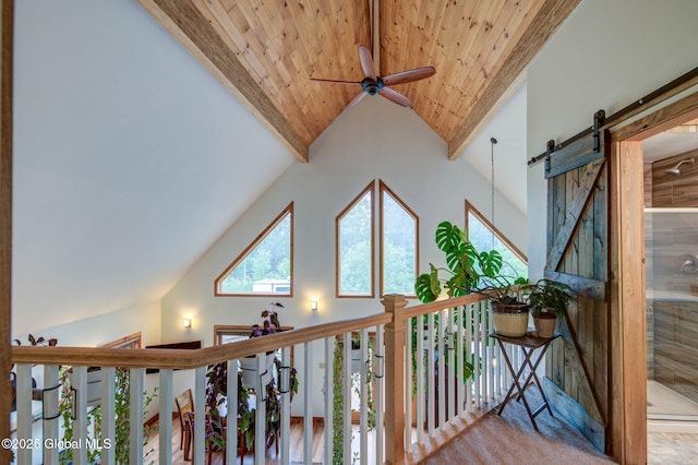 349 Methodist Farm Rd, Sand Lake, NY 12018 - hallway featuring a barn door, wood ceiling, and high vaulted ceiling