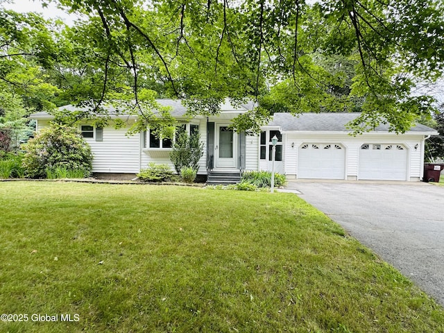 10 Spruce St, Hudson Falls, NY 12839 - single story home with a garage, driveway, and a front lawn