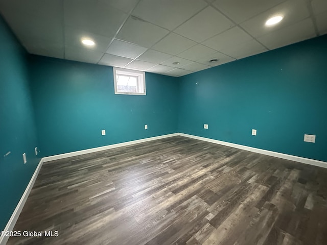 10 Spruce St, Hudson Falls, NY 12839 - unfurnished room with dark wood-type flooring and a paneled ceiling