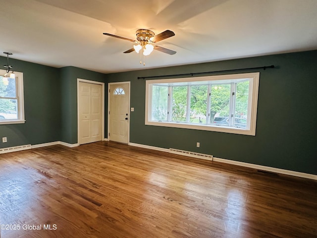 10 Spruce St, Hudson Falls, NY 12839 - foyer entrance featuring healthy amount of natural light, a ceiling fan, and wood finished floors