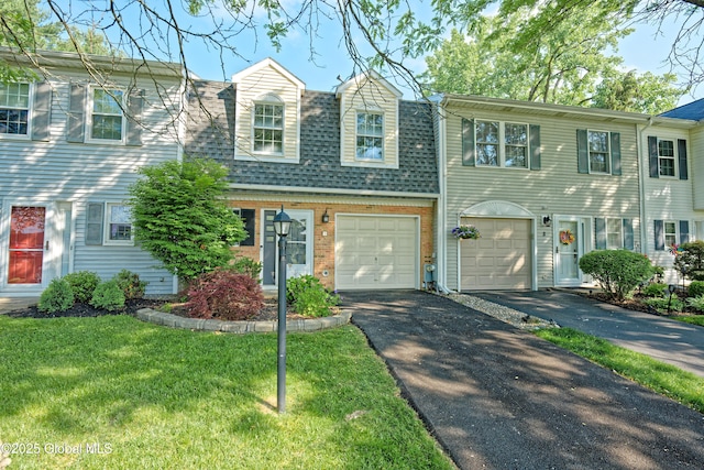 5 Bridgewood Ln, Watervliet, NY 12189 - townhome / multi-family property featuring driveway, a garage, a front lawn, and a shingled roof