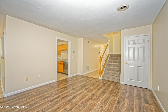 5 Bridgewood Ln, Watervliet, NY 12189 - empty room with wood finished floors and stairs