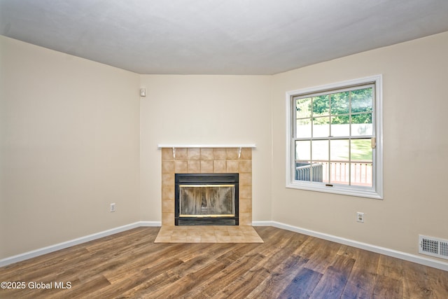 5 Bridgewood Ln, Watervliet, NY 12189 - unfurnished living room with wood finished floors and a fireplace