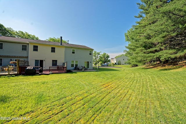 5 Bridgewood Ln, Watervliet, NY 12189 - back of house with a yard and a wooden deck