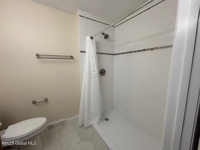 5 Bridgewood Ln, Watervliet, NY 12189 - full bath featuring a tile shower and marble finish flooring