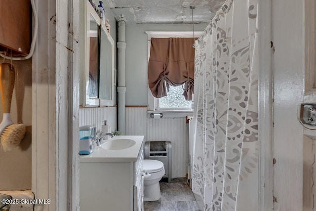 75-77 S 3rd St, Hudson, NY 12534 - bathroom with vanity, wainscoting, and a shower with curtain