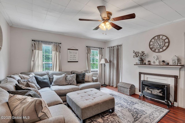 75-77 S 3rd St, Hudson, NY 12534 - living area with healthy amount of natural light, a ceiling fan, wood finished floors, a fireplace, and ornamental molding