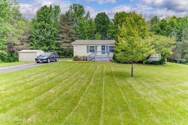 114 Burdick Rd, Johnstown, NY 12078 - view of front of home with driveway and a front lawn