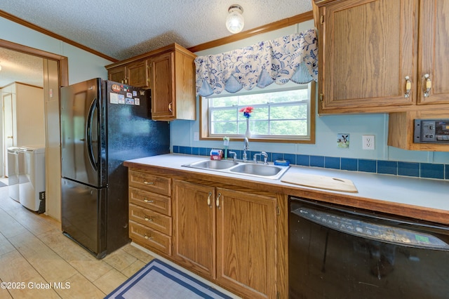 114 Burdick Rd, Johnstown, NY 12078 - kitchen featuring black appliances, a textured ceiling, ornamental molding, brown cabinetry, and light countertops