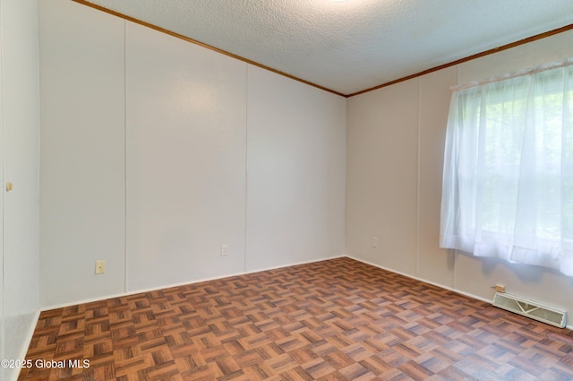 114 Burdick Rd, Johnstown, NY 12078 - empty room featuring plenty of natural light, ornamental molding, and a textured ceiling
