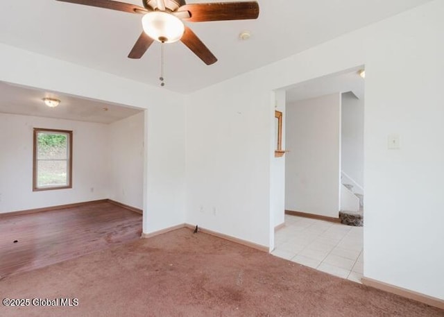 1572 2nd St, Rensselaer, NY 12144 - empty room featuring carpet floors and a ceiling fan