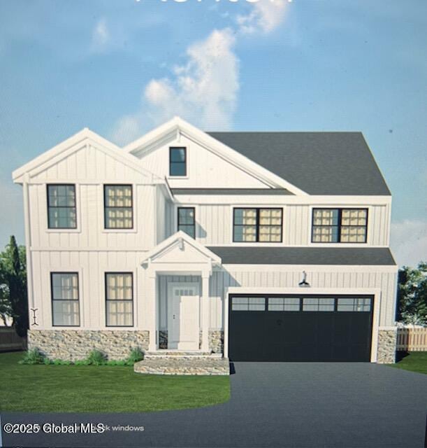 LOT22 Windrow Way, Halfmoon, NY 12118 - view of front of property with stone siding, driveway, a front yard, and board and batten siding