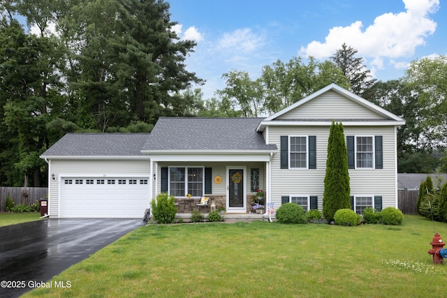 20 Quarry Circle Way, Kingsbury, NY 12839 - split level home with asphalt driveway, a garage, a porch, and a shingled roof