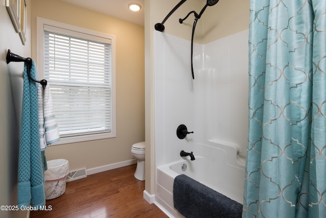 20 Quarry Circle Way, Kingsbury, NY 12839 - bathroom featuring wood finished floors and shower / tub combo with curtain