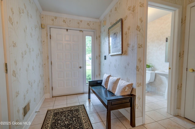 125 Bridgewood Ln, Colonie, NY 12189 - entryway with light tile patterned floors, wallpapered walls, and crown molding
