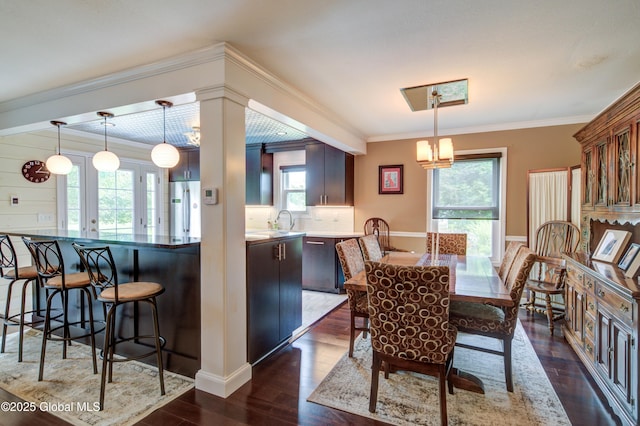 125 Bridgewood Ln, Colonie, NY 12189 - dining space with dark wood finished floors and crown molding