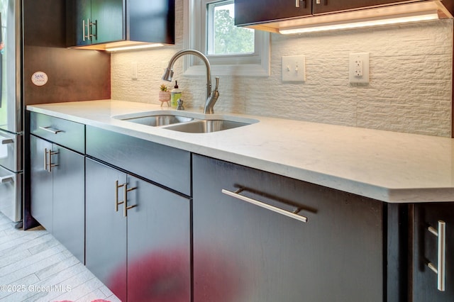125 Bridgewood Ln, Colonie, NY 12189 - kitchen featuring a sink and tasteful backsplash