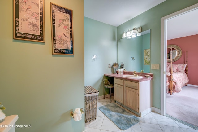 125 Bridgewood Ln, Colonie, NY 12189 - bathroom with vanity, ensuite bathroom, and marble finish floors