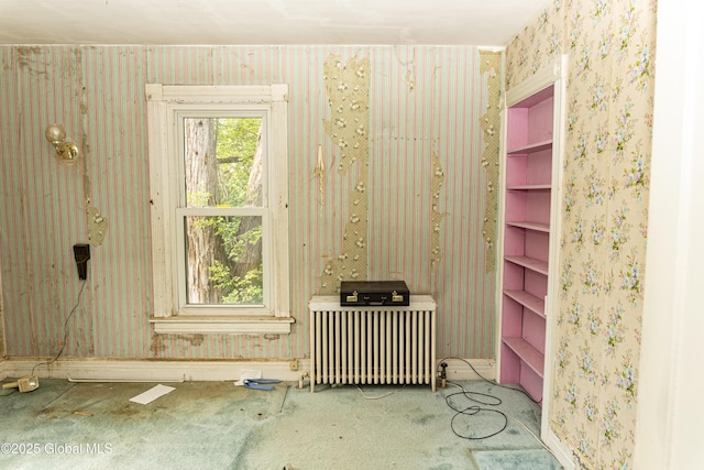 53 Broad St, Catskill, NY 12414 - empty room featuring wallpapered walls and radiator