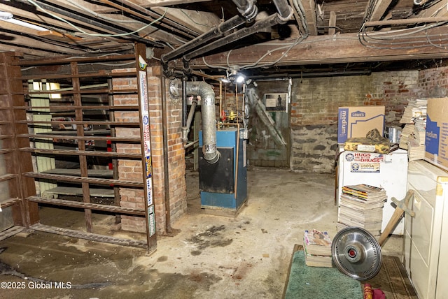 53 Broad St, Catskill, NY 12414 - unfinished below grade area featuring a heating unit