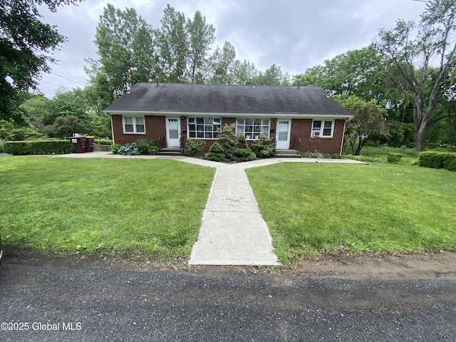 9 Brayton St, Colonie, NY 12205 - single story home featuring brick siding, a front lawn, and entry steps