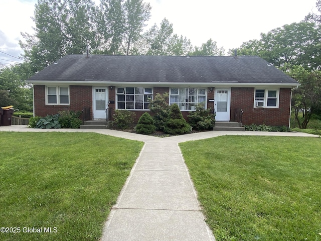 9 Brayton St, Colonie, NY 12205 - ranch-style house with brick siding, a front lawn, and entry steps