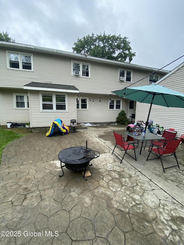 9 Brayton St, Colonie, NY 12205 - back of house with a patio area, an outdoor fire pit, and outdoor dining area