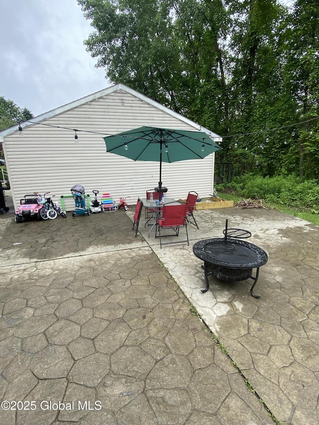 9 Brayton St, Colonie, NY 12205 - view of patio / terrace with a fire pit