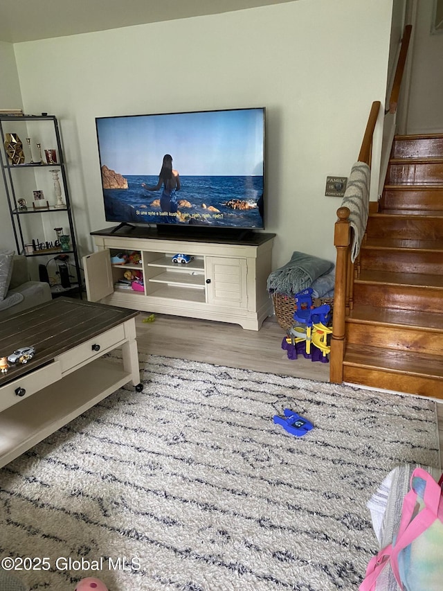 9 Brayton St, Colonie, NY 12205 - living room with wood finished floors and stairs
