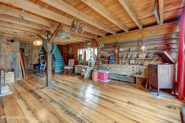 448 State Highway 334, Johnstown, NY 12095 - basement with hardwood / wood-style floors, stairway, wooden ceiling, and wooden walls