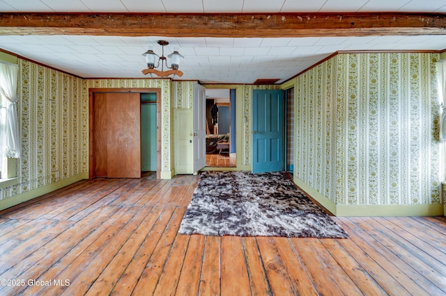 448 State Highway 334, Johnstown, NY 12095 - unfurnished room with wallpapered walls, ornamental molding, and wood-type flooring