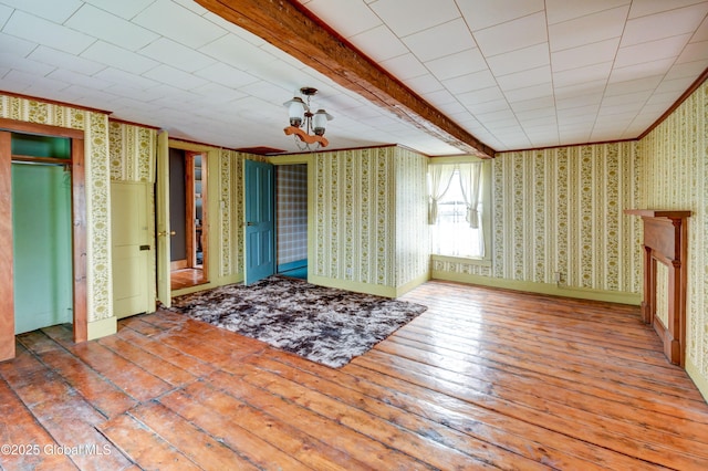 448 State Highway 334, Johnstown, NY 12095 - unfurnished room featuring wallpapered walls, hardwood / wood-style flooring, and crown molding