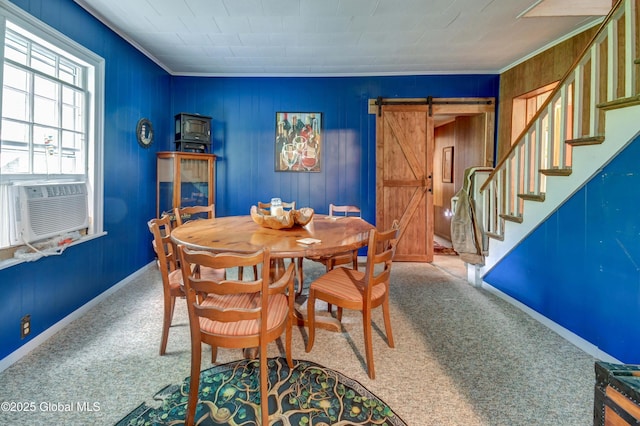 448 State Highway 334, Johnstown, NY 12095 - carpeted dining space featuring a barn door, stairs, crown molding, wood walls, and cooling unit